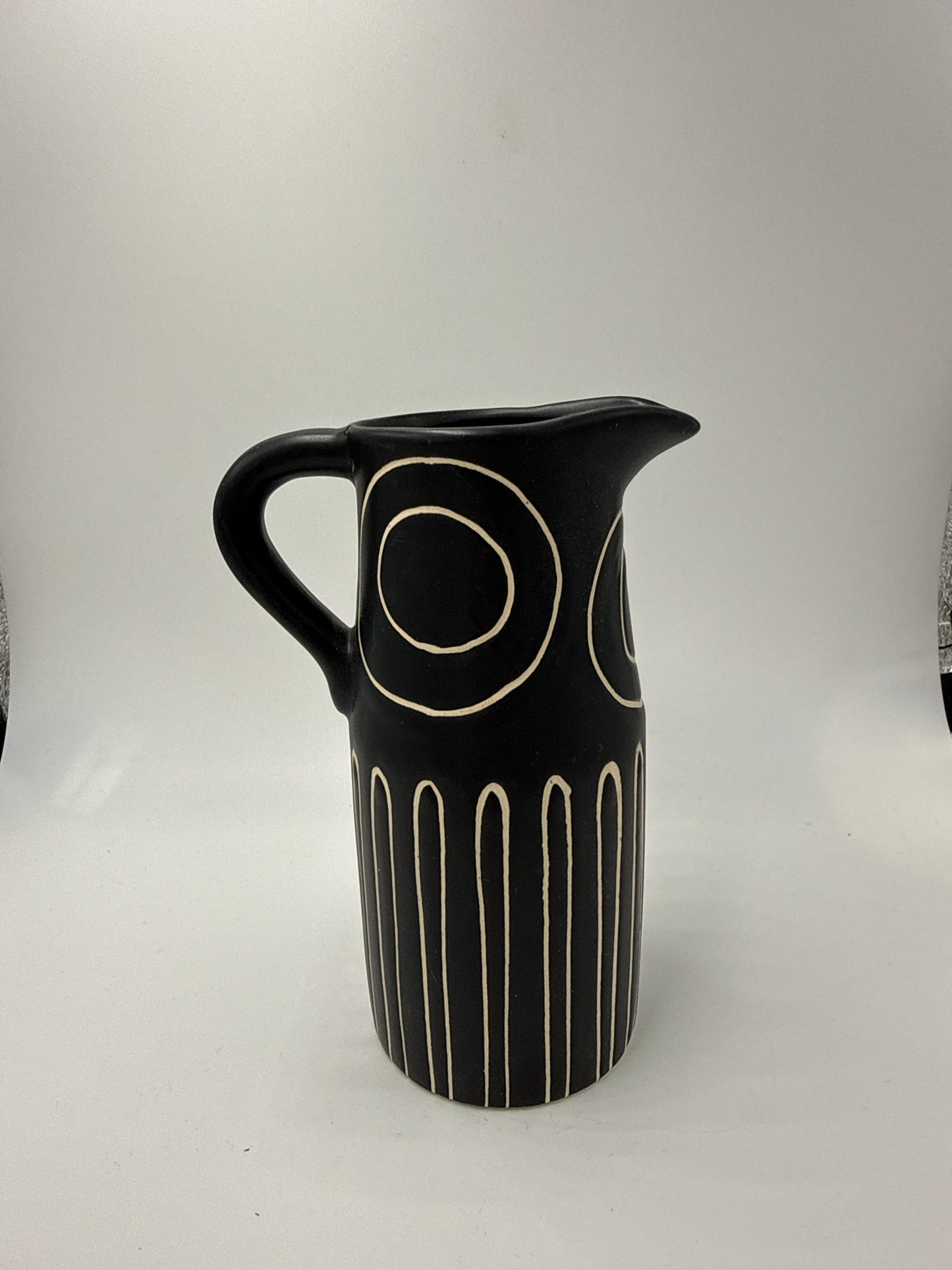 Small black and white pitcher